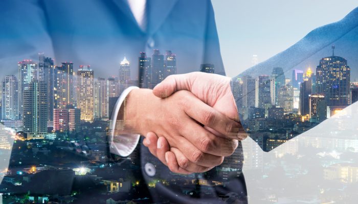 Double,Exposure,Of,Business,Handshake,For,Successful,Of,Investment,Deal